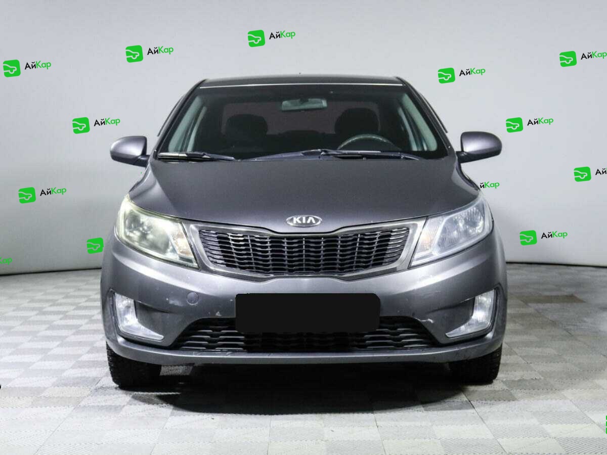 Kia Rio с пробегом — 2013 год. Фото: #1