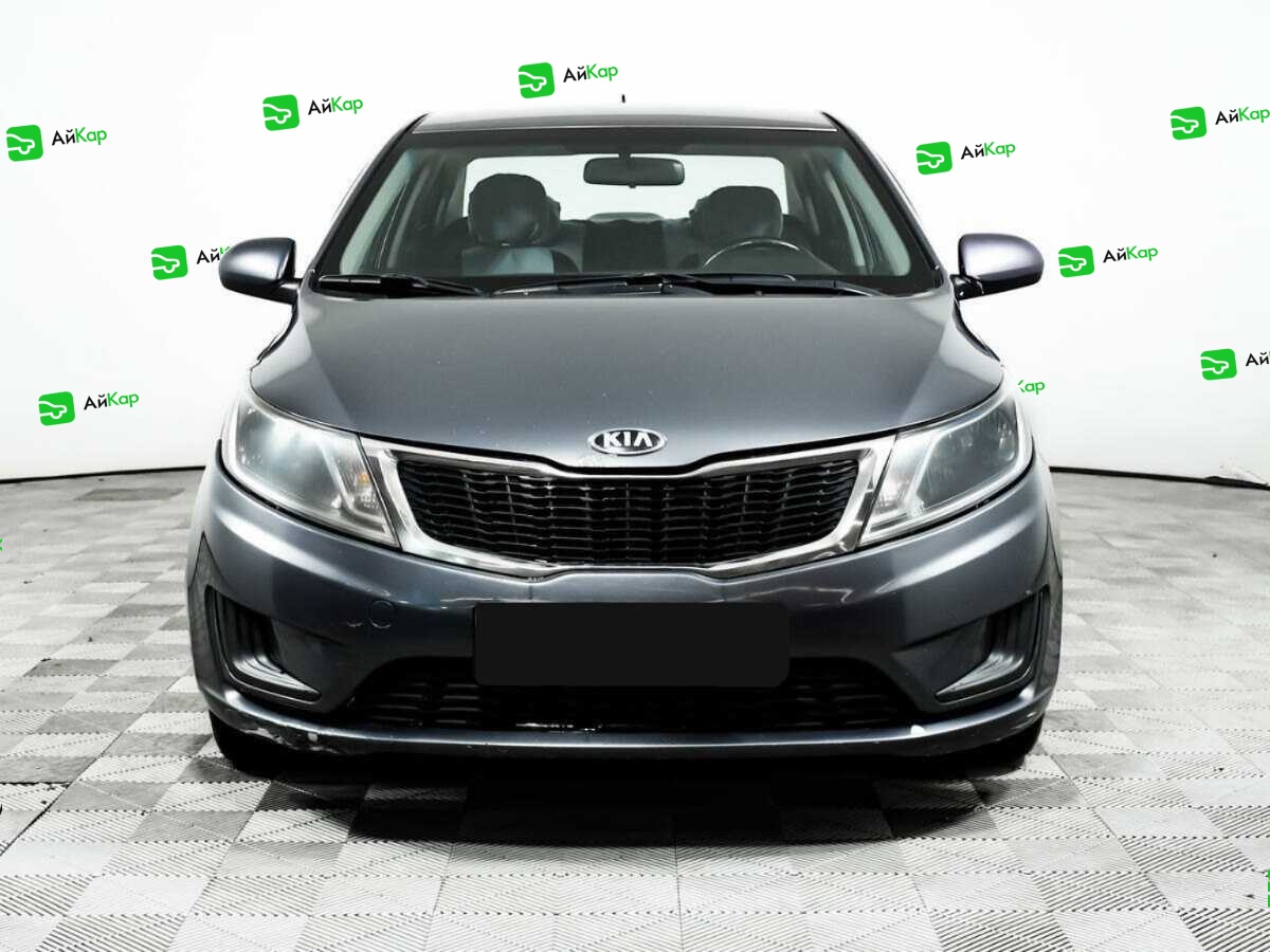 Kia Rio с пробегом — 2014 год. Фото: #1