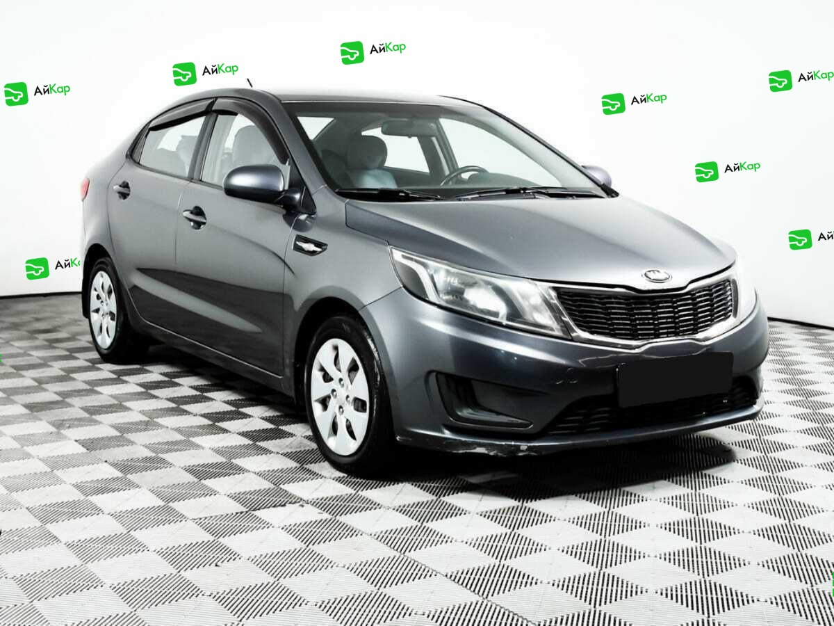 Kia Rio с пробегом — 2014 год. Фото: #2