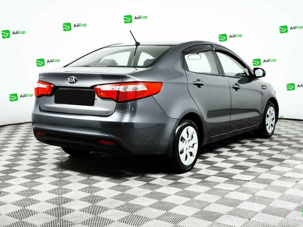 Kia Rio с пробегом — 2014 год. Фото: #4