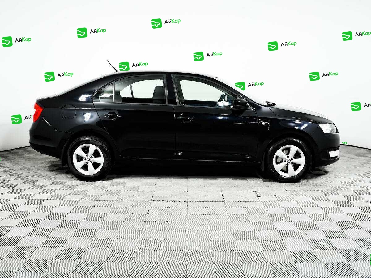 Skoda Rapid с пробегом — 2014 год. Фото: #3