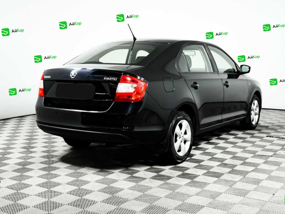 Skoda Rapid с пробегом — 2014 год. Фото: #4