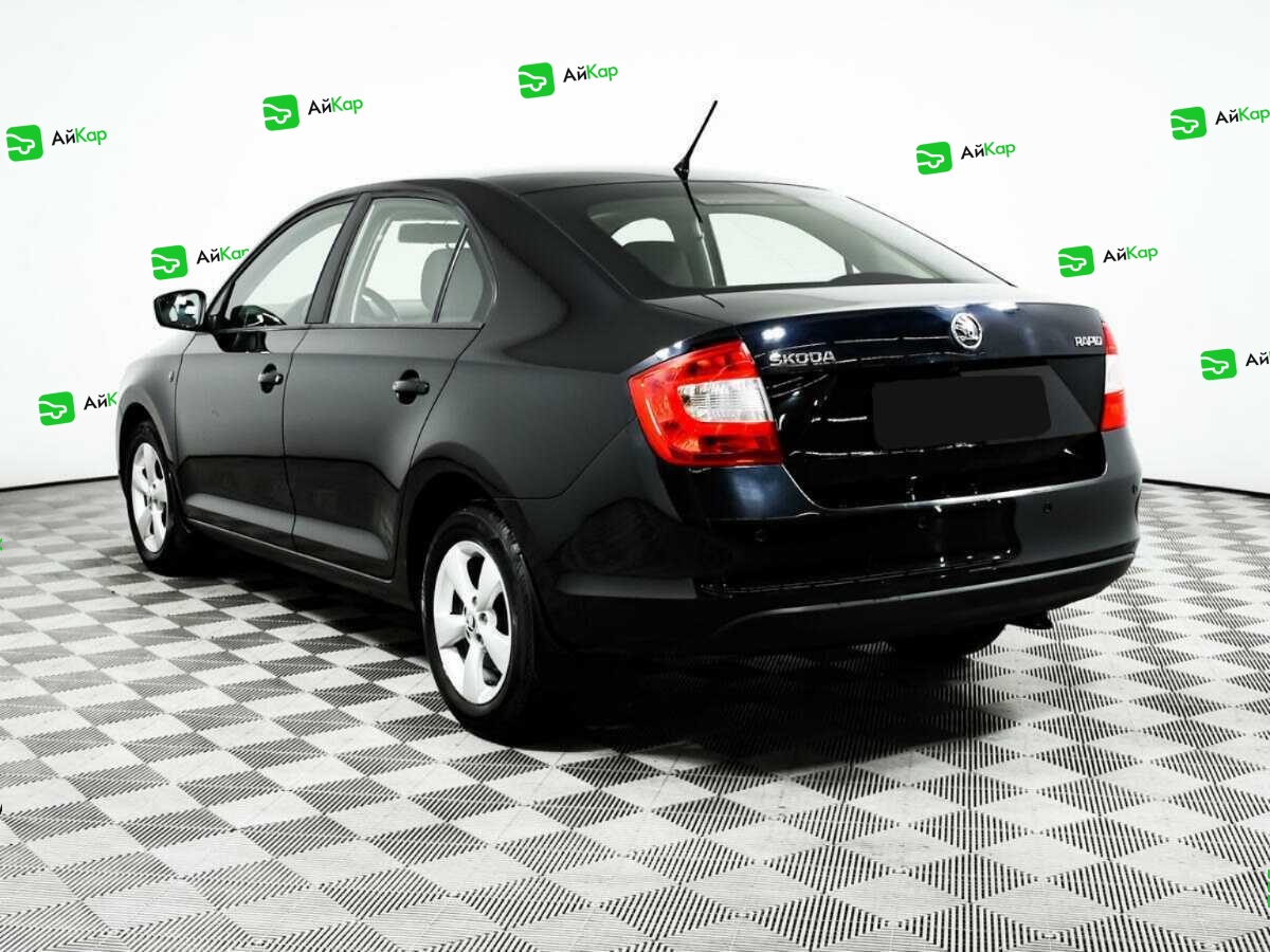 Skoda Rapid с пробегом — 2014 год. Фото: #6