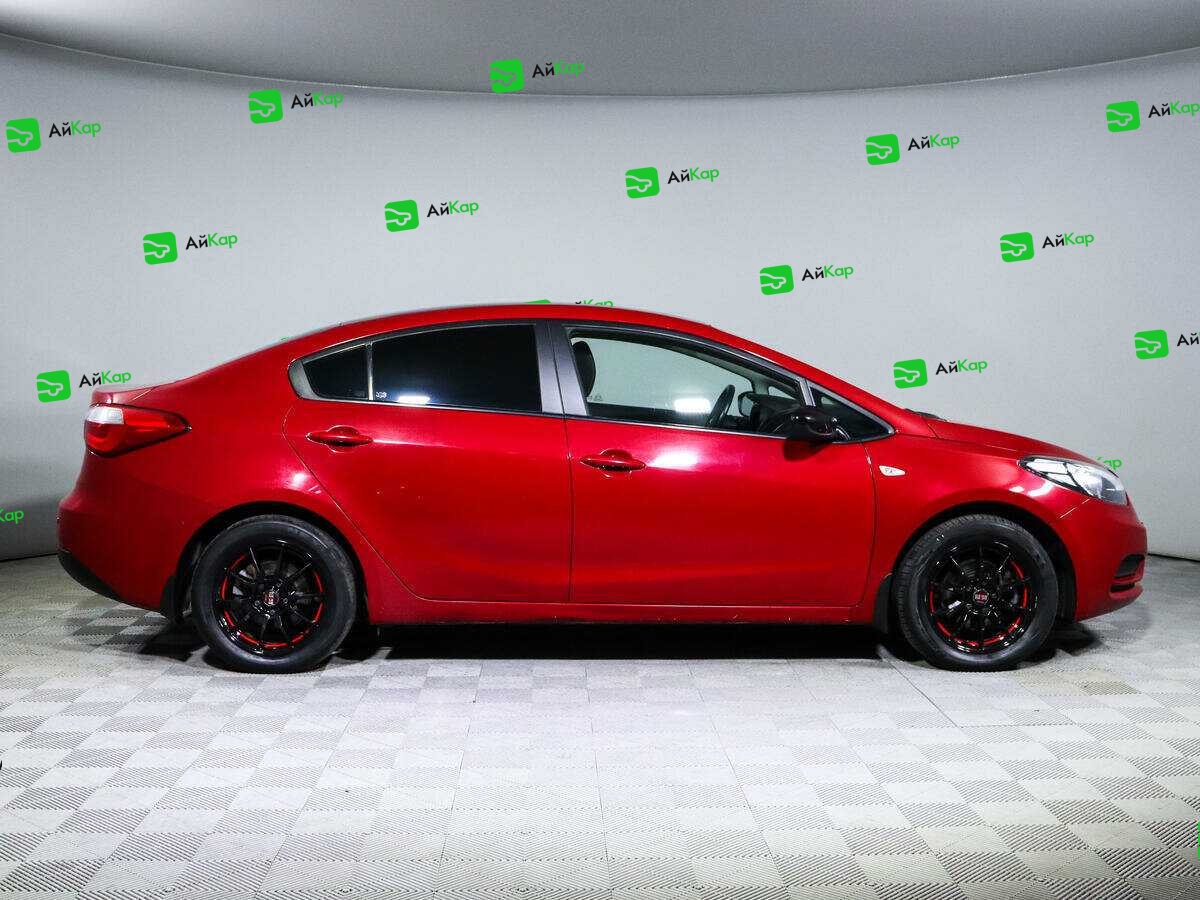 Kia Cerato с пробегом — 2014 год. Фото: #3
