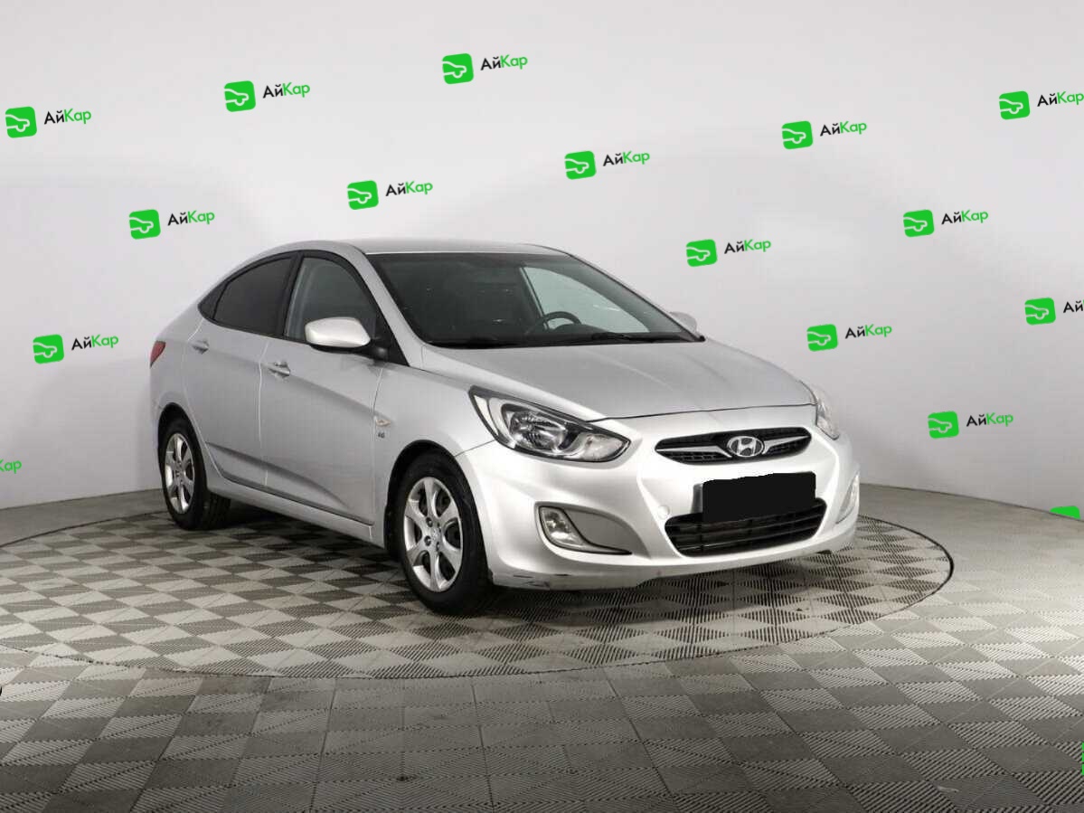 Hyundai Solaris с пробегом — 2012 год. Фото: #2