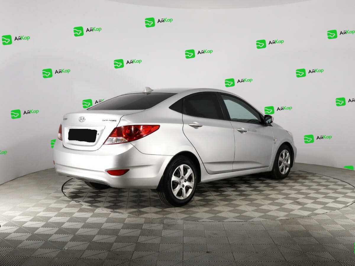 Hyundai Solaris с пробегом — 2012 год. Фото: #7