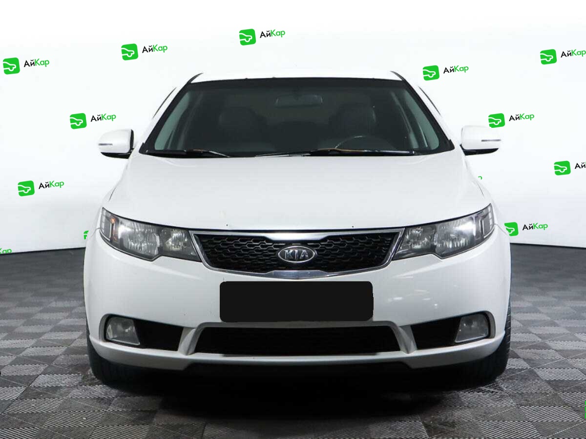 Kia Cerato с пробегом — 2012 год. Фото: #1