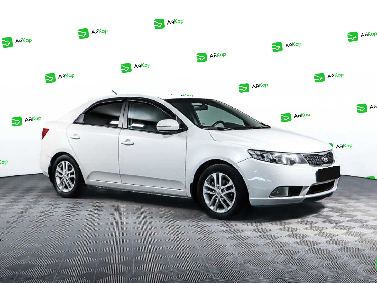 Kia Cerato с пробегом — 2012 год. Фото: #2