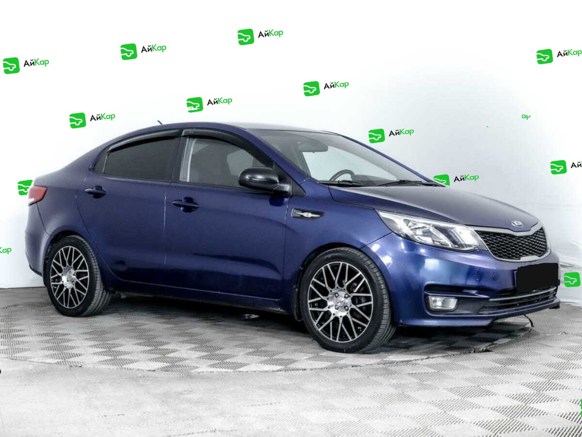 Kia Rio с пробегом — 2015 год. Фото: #2