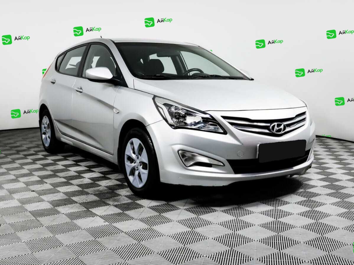 Hyundai Solaris с пробегом — 2014 год. Фото: #2