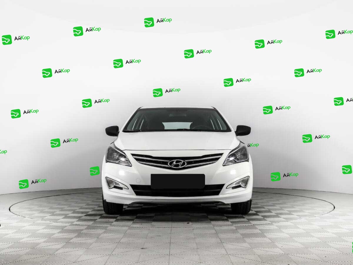 Hyundai Solaris с пробегом — 2015 год. Фото: #1