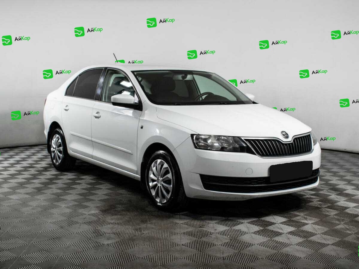Skoda Rapid с пробегом — 2014 год. Фото: #2