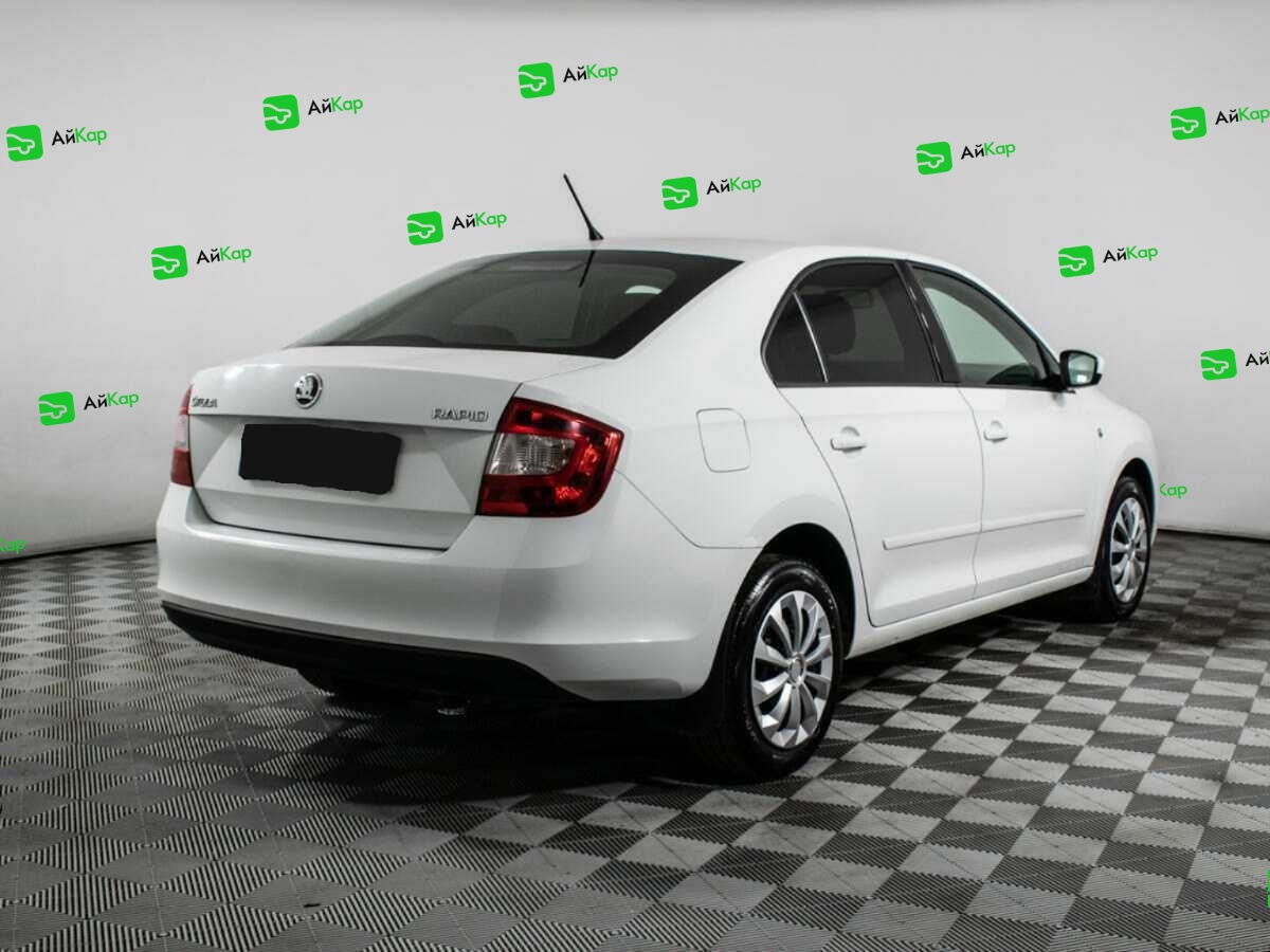 Skoda Rapid с пробегом — 2014 год. Фото: #3