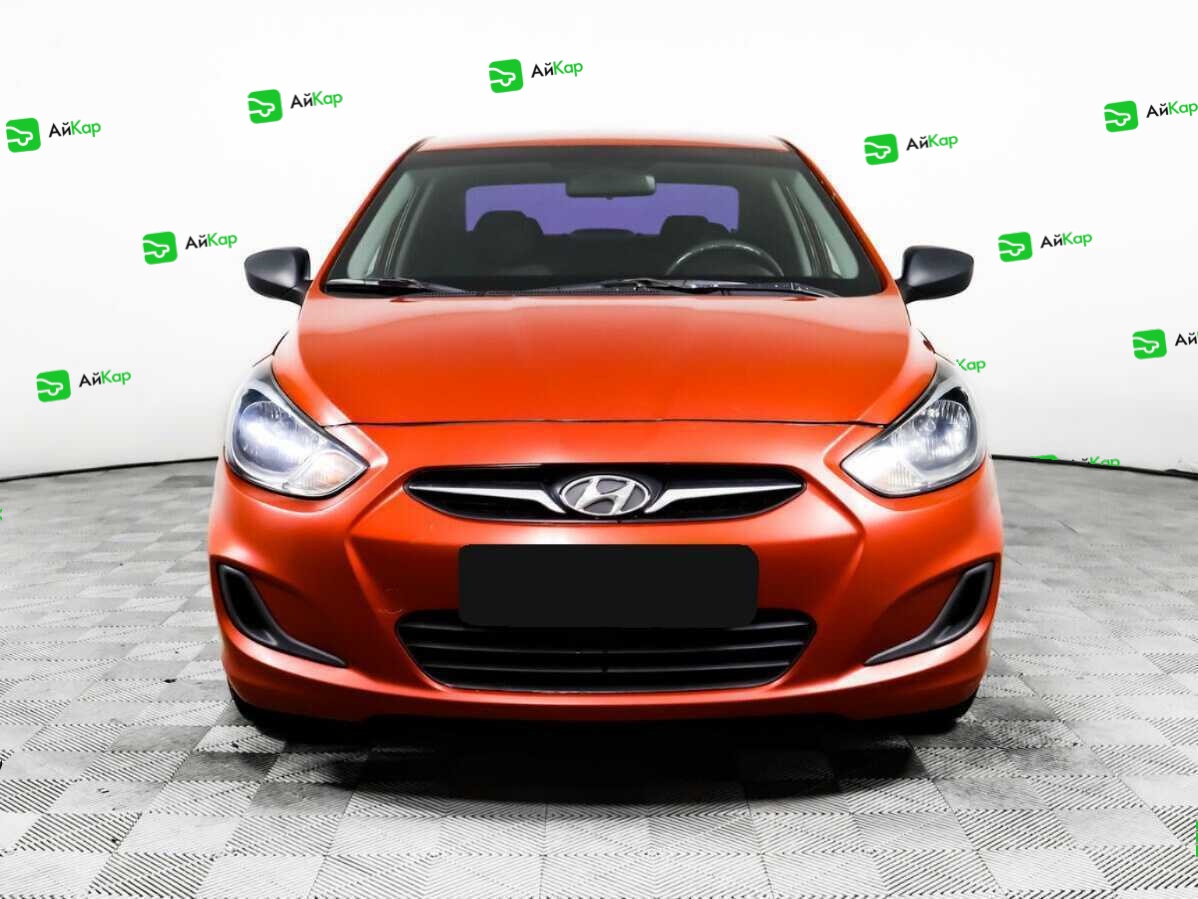 Hyundai Solaris с пробегом — 2012 год. Фото: #1