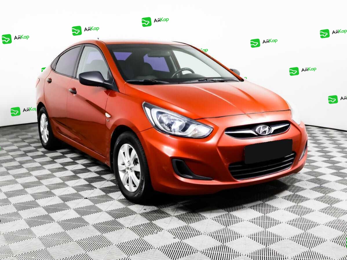 Hyundai Solaris с пробегом — 2012 год. Фото: #2