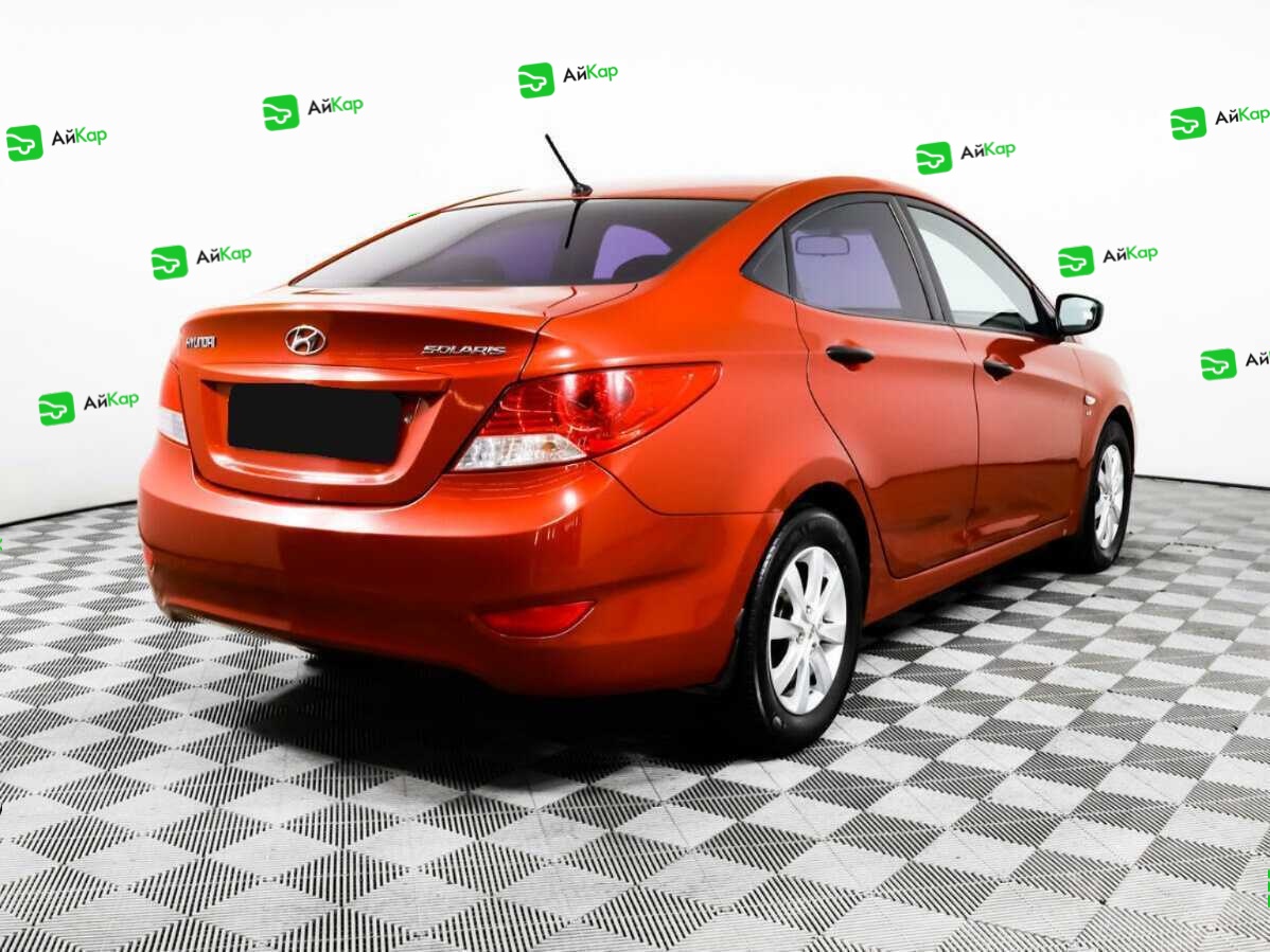 Hyundai Solaris с пробегом — 2012 год. Фото: #4