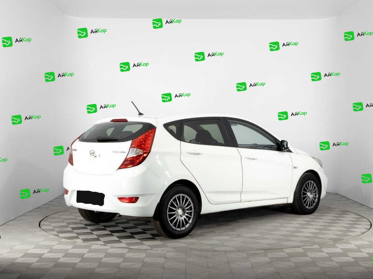 Hyundai Solaris с пробегом — 2012 год. Фото: #4