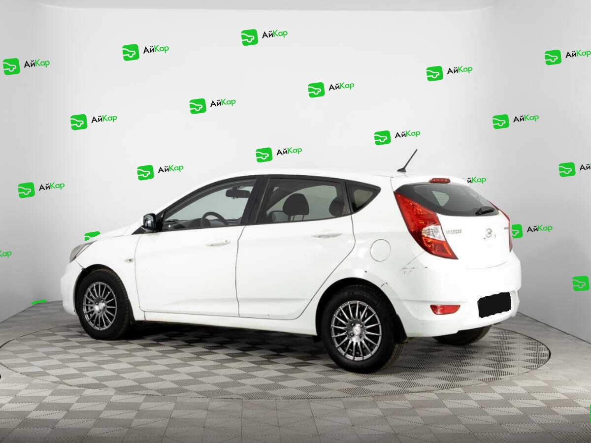 Hyundai Solaris с пробегом — 2012 год. Фото: #6