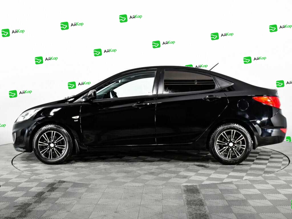 Hyundai Solaris с пробегом — 2012 год. Фото: #7