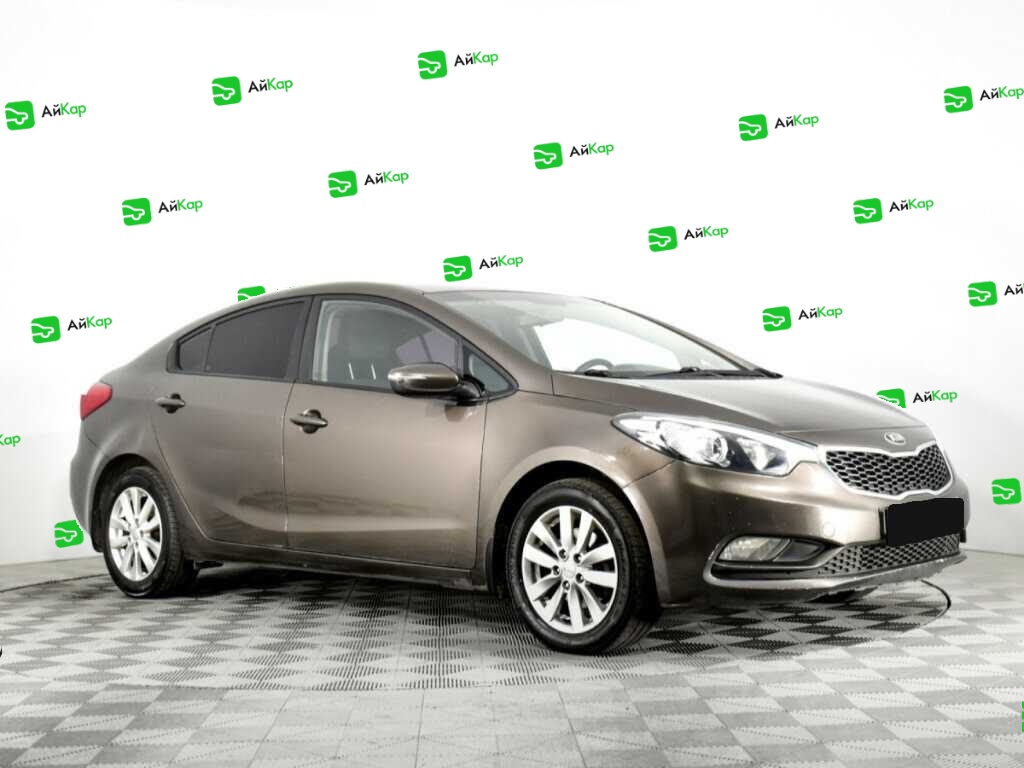 Kia Cerato с пробегом — 2015 год. Фото: #2