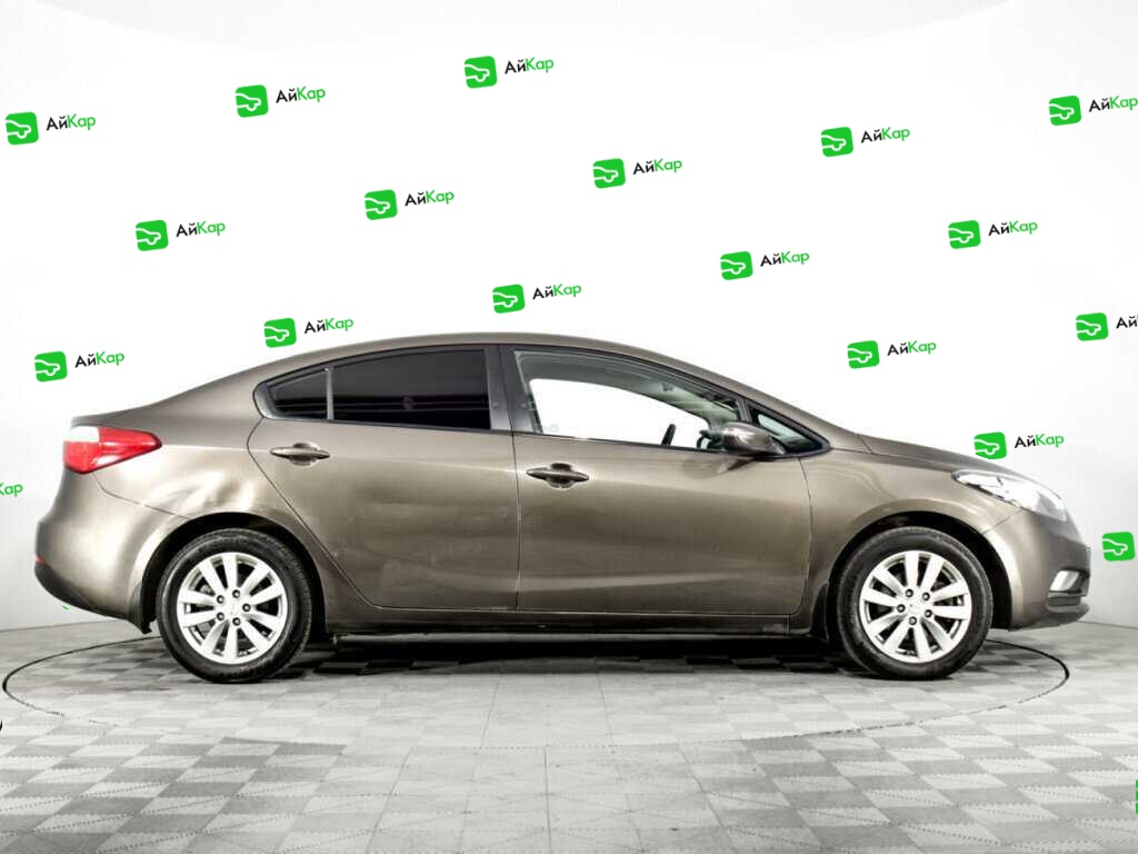 Kia Cerato с пробегом — 2015 год. Фото: #3