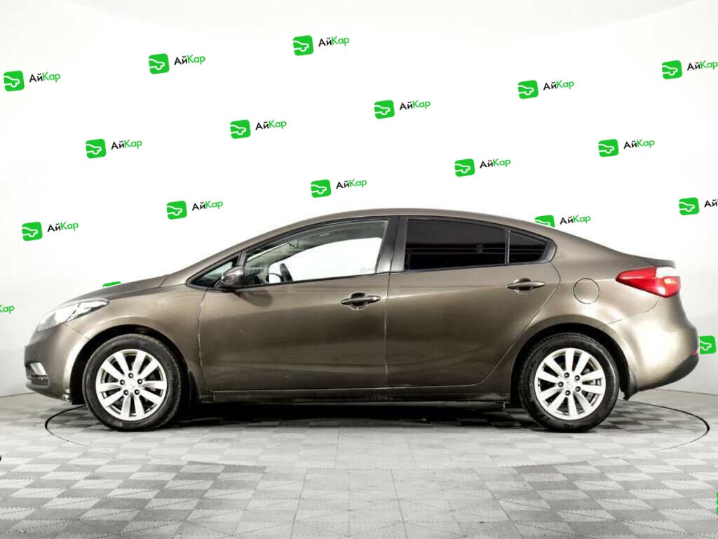 Kia Cerato с пробегом — 2015 год. Фото: #7