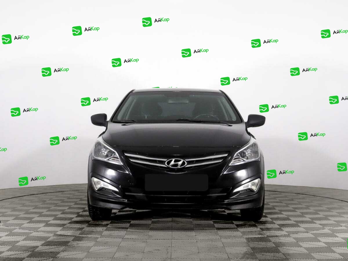 Hyundai Solaris с пробегом — 2014 год. Фото: #1