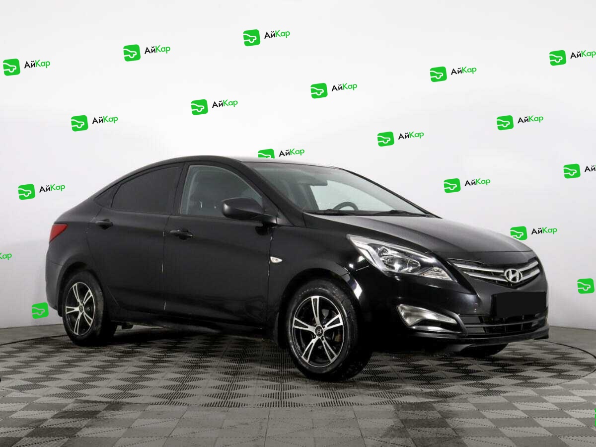 Hyundai Solaris с пробегом — 2014 год. Фото: #2