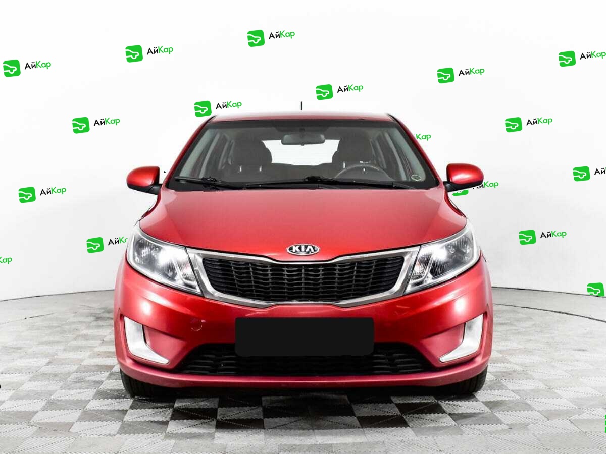 Kia Rio с пробегом — 2013 год. Фото: #1