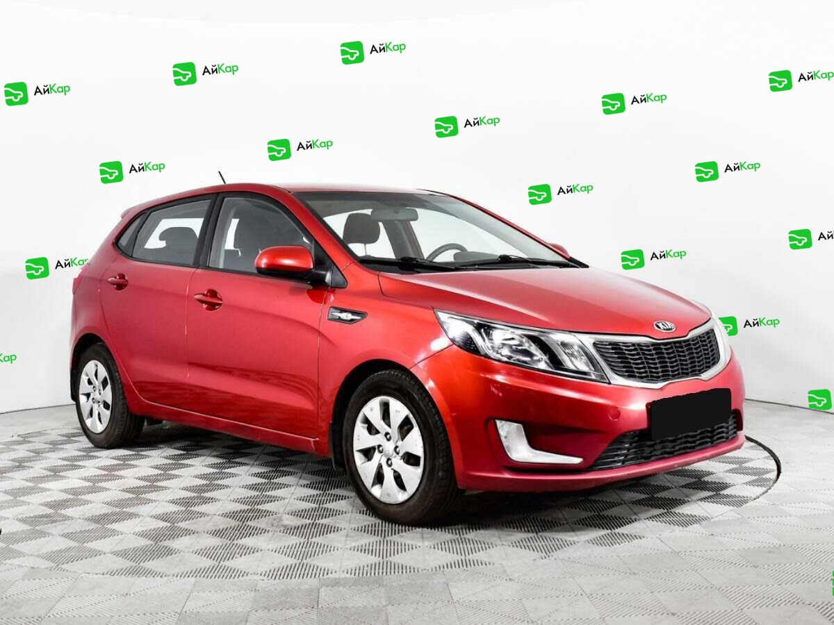 Kia Rio с пробегом — 2013 год. Фото: #2