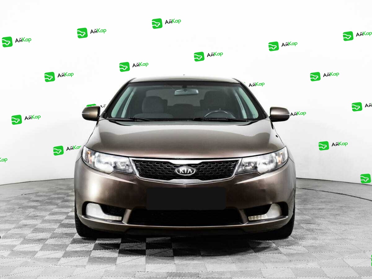 Kia Cerato с пробегом — 2012 год. Фото: #1