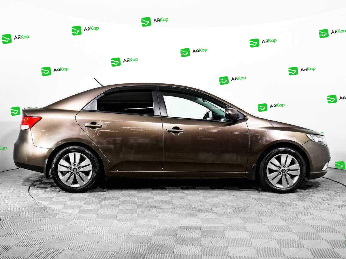 Kia Cerato с пробегом — 2012 год. Фото: #3