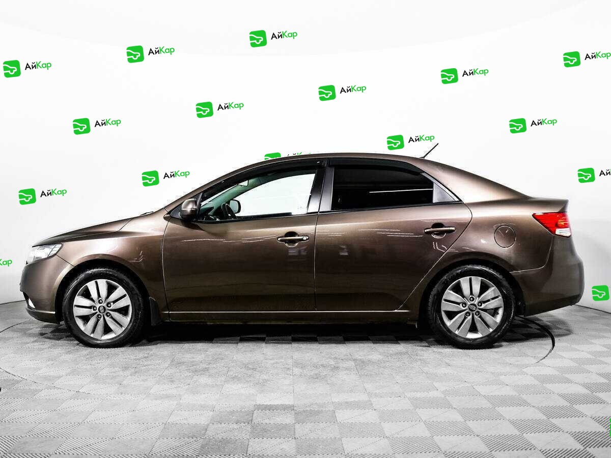 Kia Cerato с пробегом — 2012 год. Фото: #7