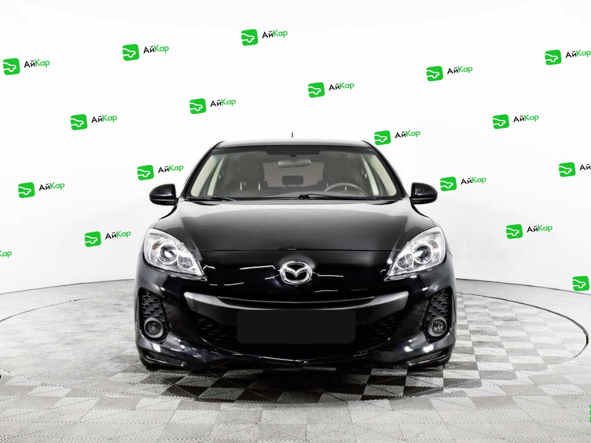 Mazda 3 с пробегом — 2012 год. Фото: #1