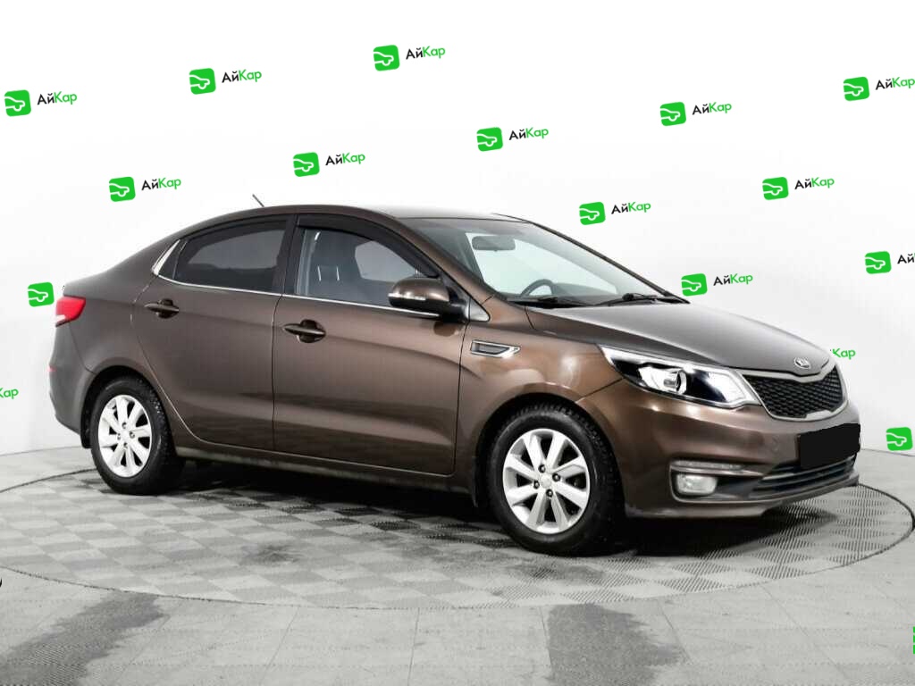 Kia Rio с пробегом — 2015 год. Фото: #2
