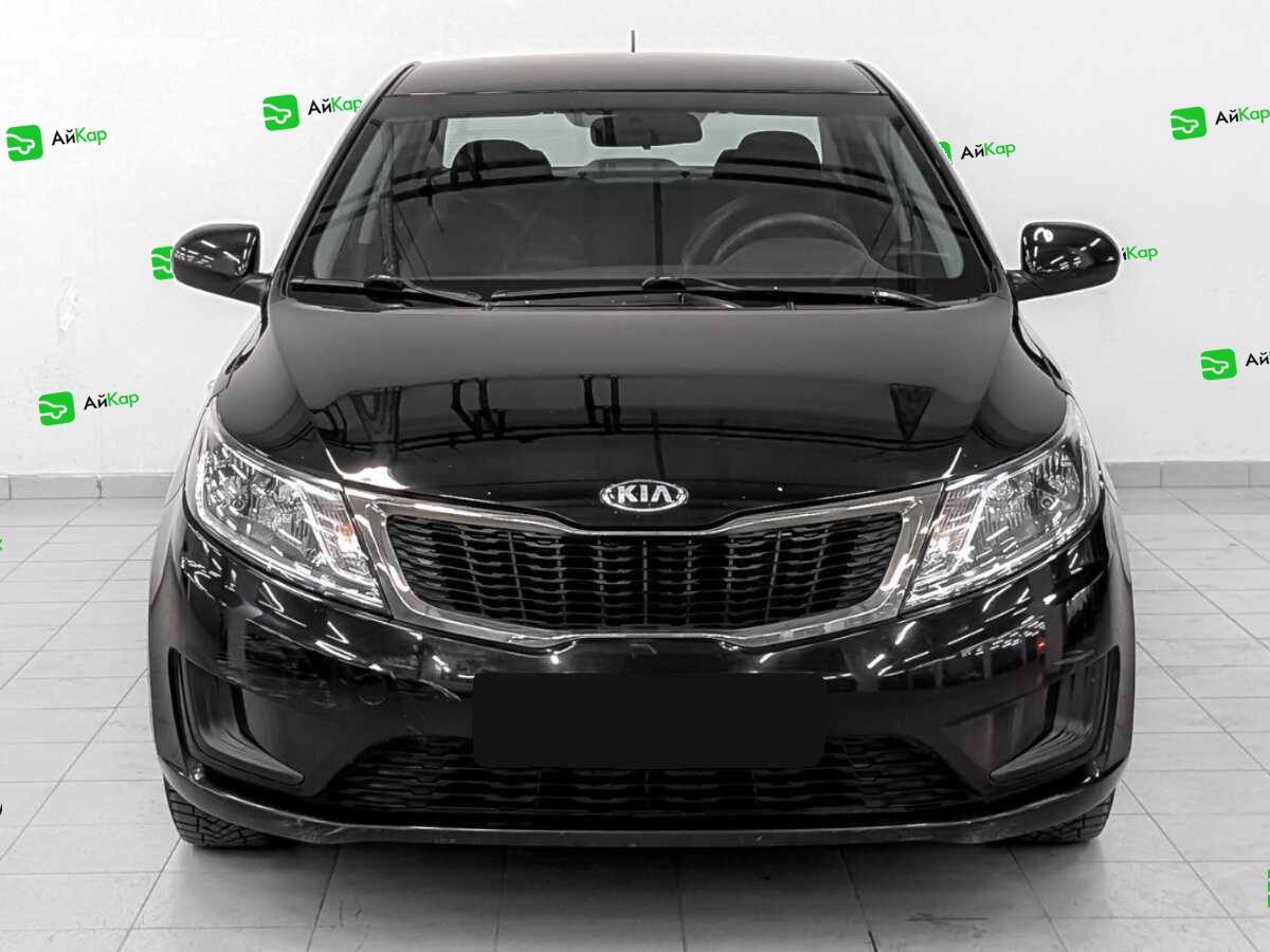 Kia Rio с пробегом — 2013 год. Фото: #1