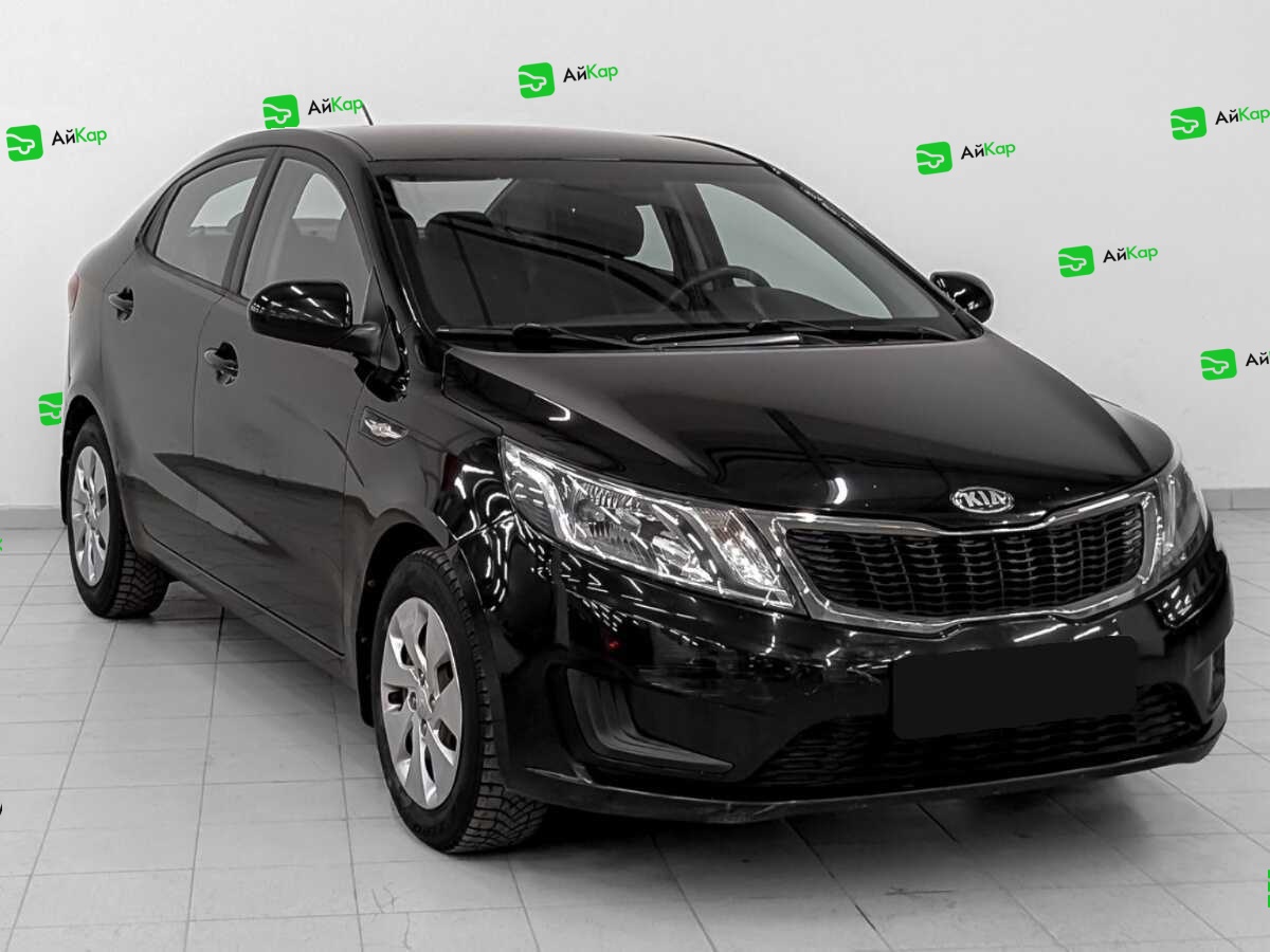 Kia Rio с пробегом — 2013 год. Фото: #2