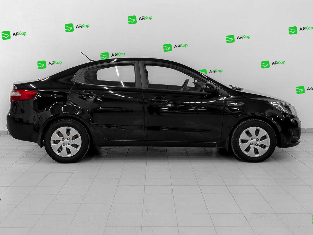 Kia Rio с пробегом — 2013 год. Фото: #3