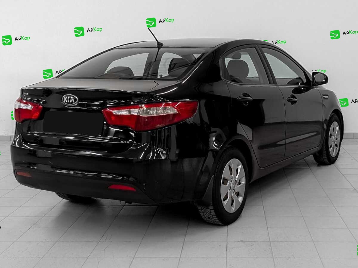 Kia Rio с пробегом — 2013 год. Фото: #4