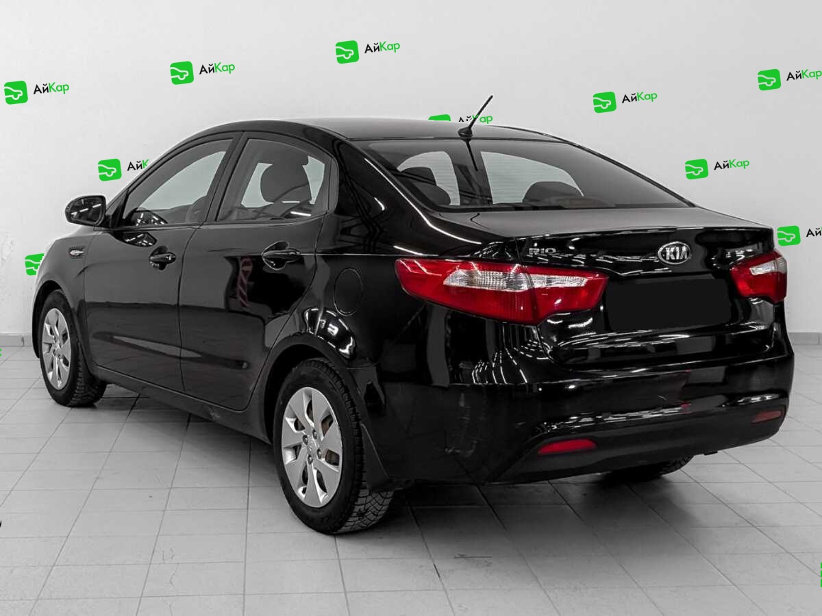 Kia Rio с пробегом — 2013 год. Фото: #6