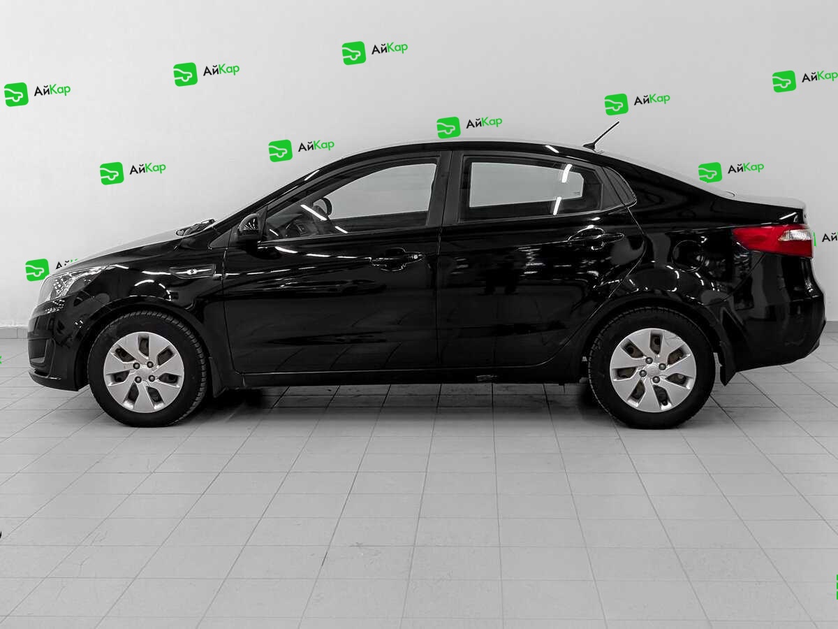 Kia Rio с пробегом — 2013 год. Фото: #7
