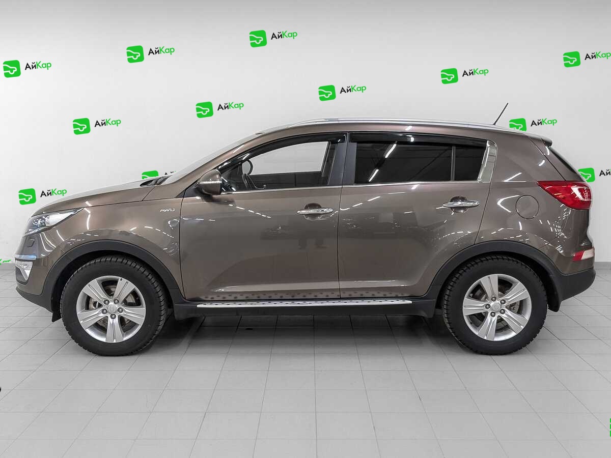 Kia Sportage с пробегом — 2014 год. Фото: #7