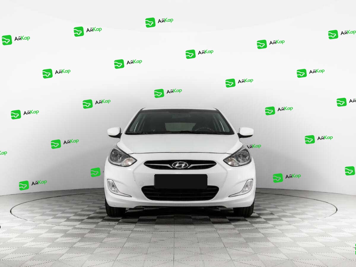 Hyundai Solaris с пробегом — 2014 год. Фото: #1