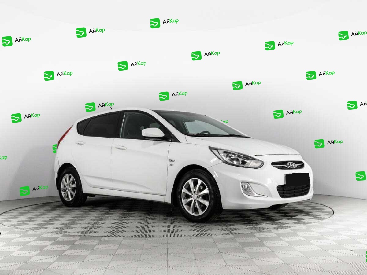 Hyundai Solaris с пробегом — 2014 год. Фото: #2