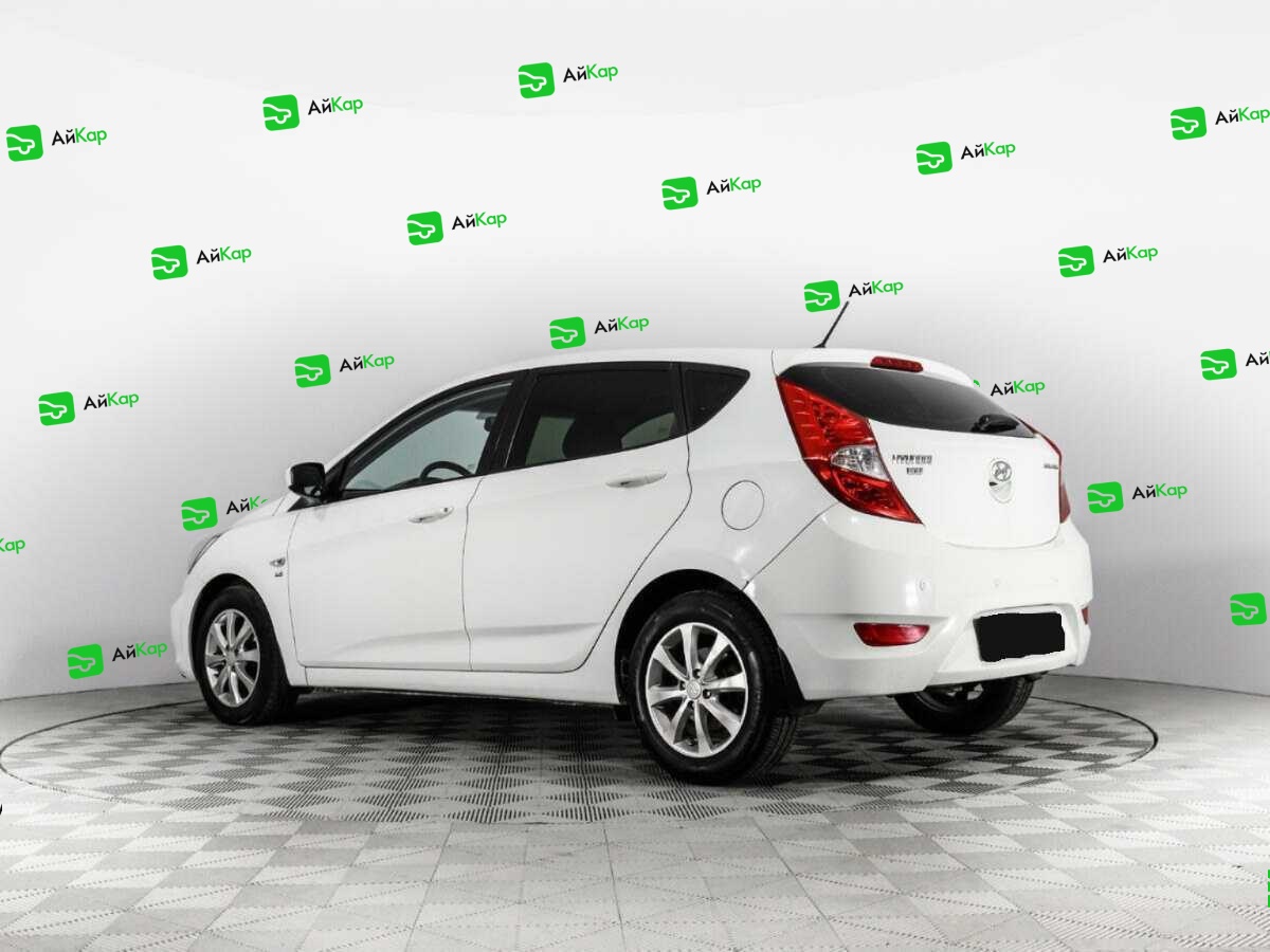 Hyundai Solaris с пробегом — 2014 год. Фото: #6