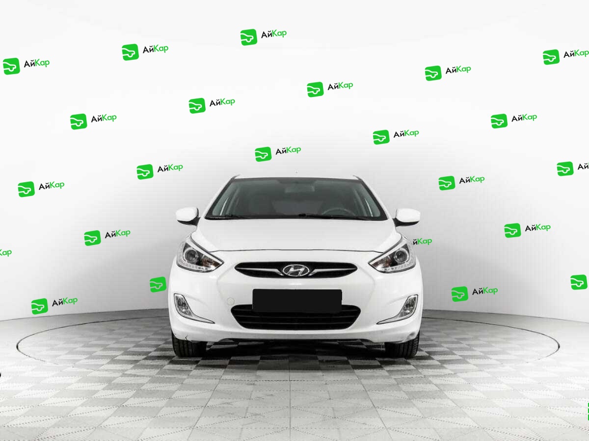 Hyundai Solaris с пробегом — 2014 год. Фото: #1