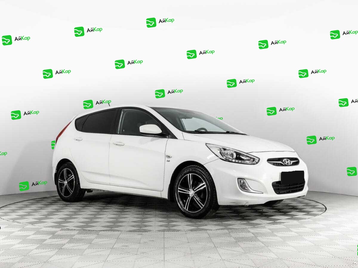 Hyundai Solaris с пробегом — 2014 год. Фото: #2