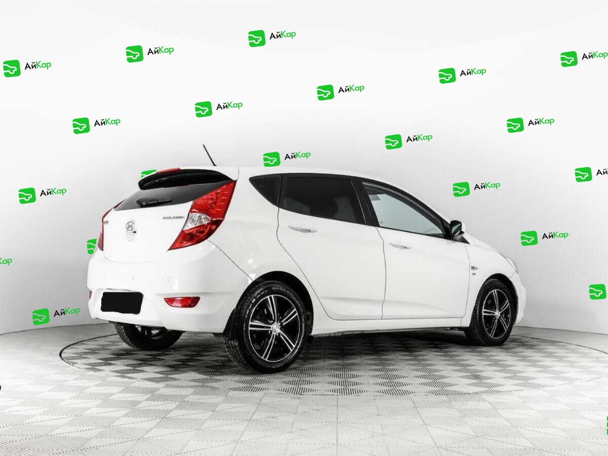 Hyundai Solaris с пробегом — 2014 год. Фото: #4