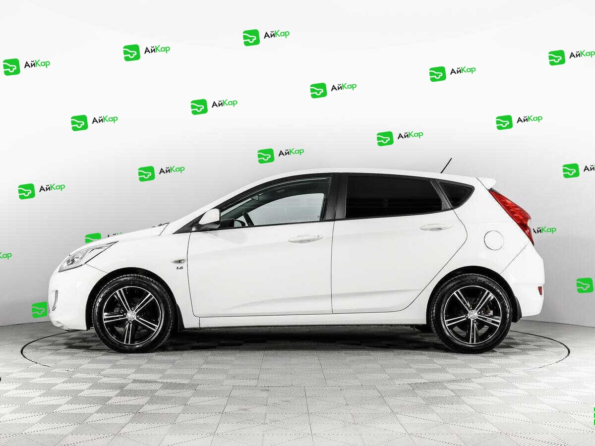 Hyundai Solaris с пробегом — 2014 год. Фото: #7