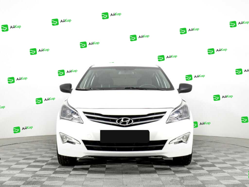 Hyundai Solaris с пробегом — 2014 год. Фото: #1